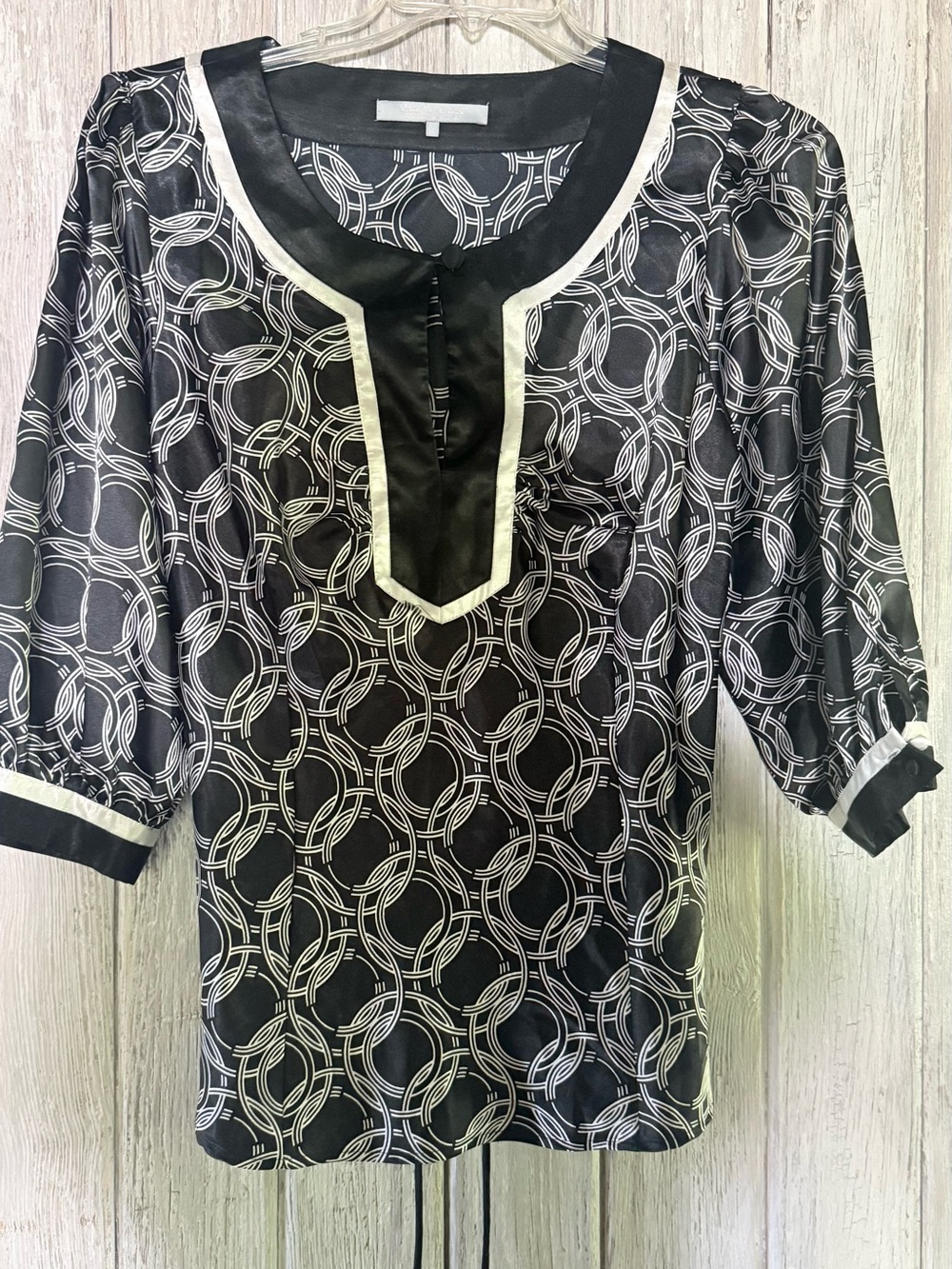 Violet & Claire Black Blouse with White Geometric Ring Pattern